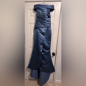 From lulus bridal. Never worn, beautiful, slate blue. Size 2 but runs big.